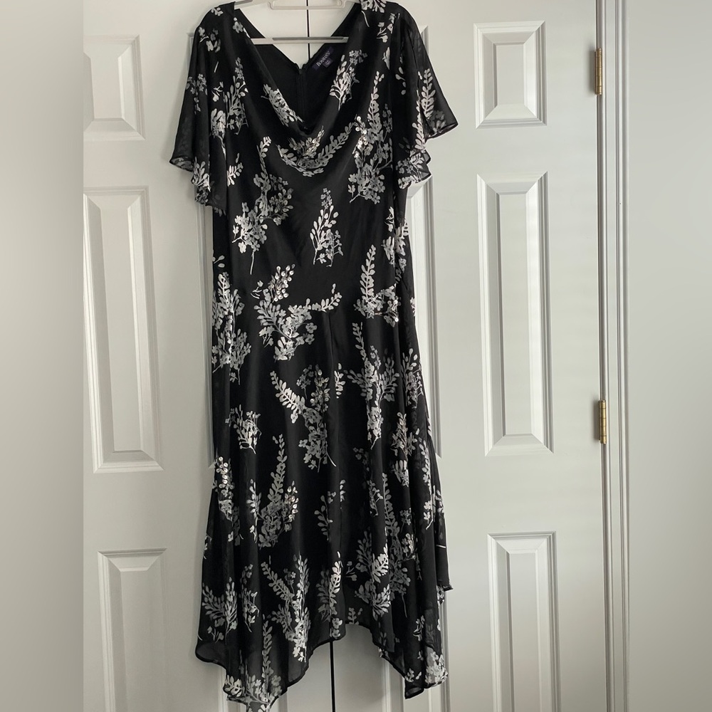 Elegant dress with flutter sleeves to sparkling sequins with a handkerchief  hem